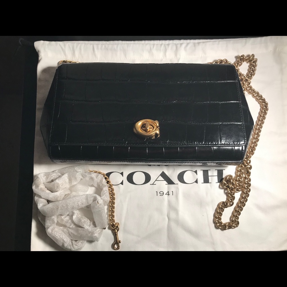 Coach Alexa turn lock clutch